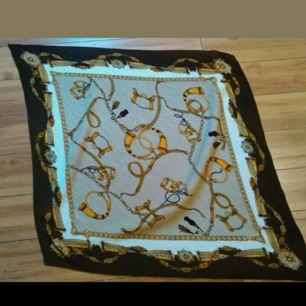 Elegant vintage silky scarf. This luxurious accessory features a beautiful chain